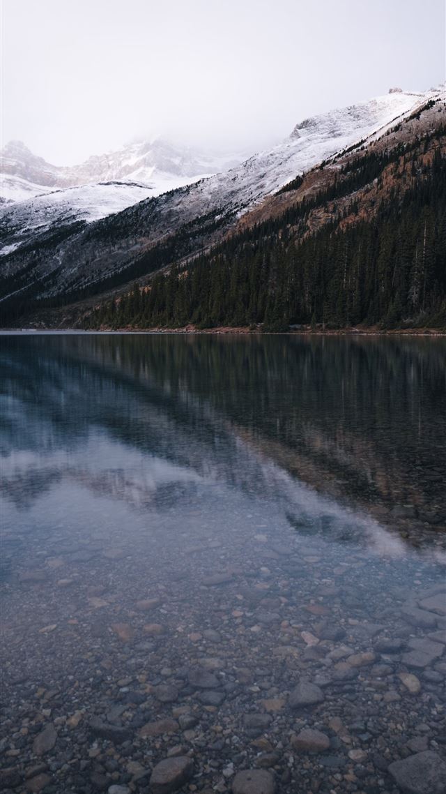 1080x1920 lake near snow covered mountain - water iPhone 8 Wallpaper