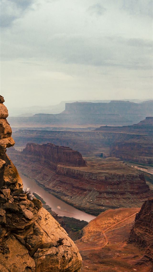 1080x1920 man standing on cliff -  iPhone 8 Wallpaper