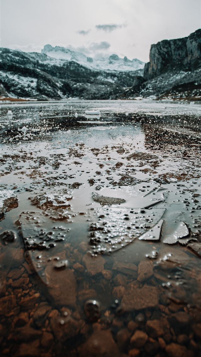 1080x1920 body of water near mountain during daytime - mountain iPhone 8 Wallpaper