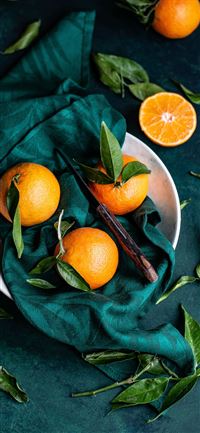 Clementines with leaves wallpaper