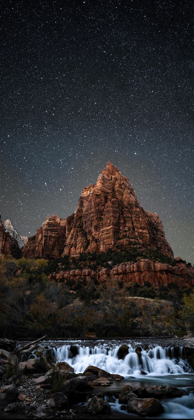 1080x1920 plateau and body of water at night -  iPhone SE Wallpaper