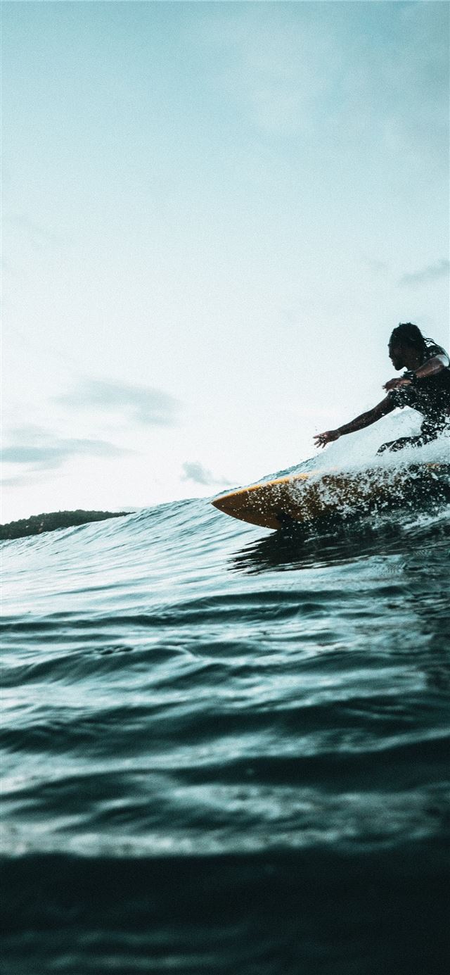 1080x1920 man surfboarding during daytime - sport iPhone SE Wallpaper