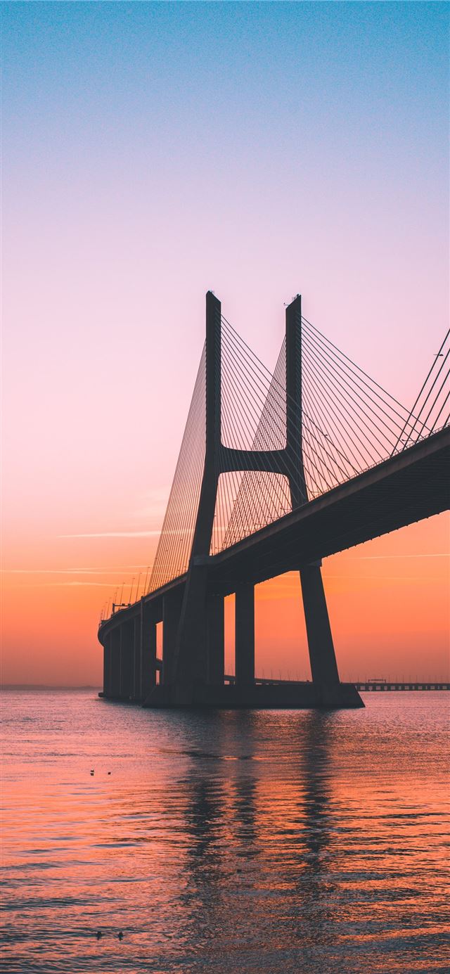1080x1920 silhouette of bridge under clear sky - sky iPhone SE Wallpaper