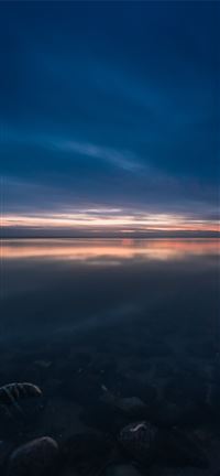 body of water at night wallpaper