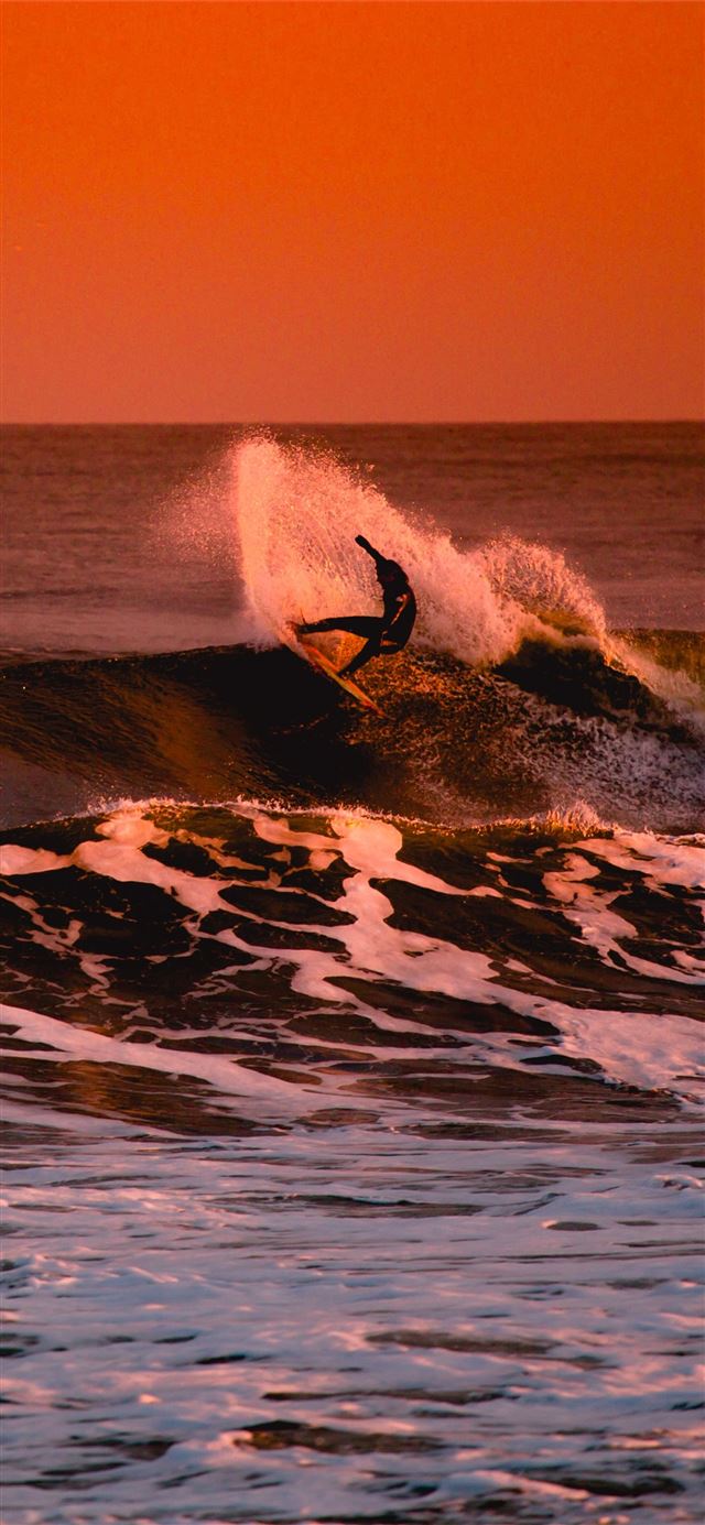 1080x1920 person surfing during sunset - wave iPhone SE Wallpaper