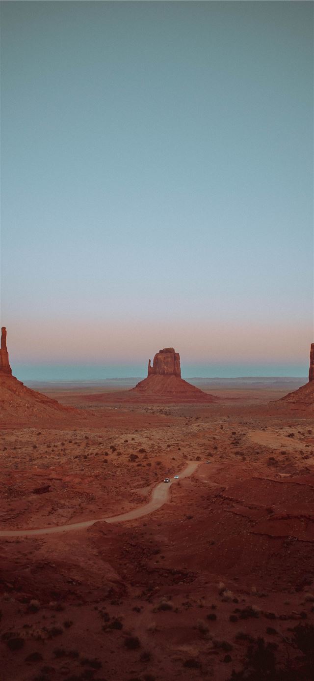 1080x1920 brown rocky mountains and field during day - ut iPhone SE Wallpaper