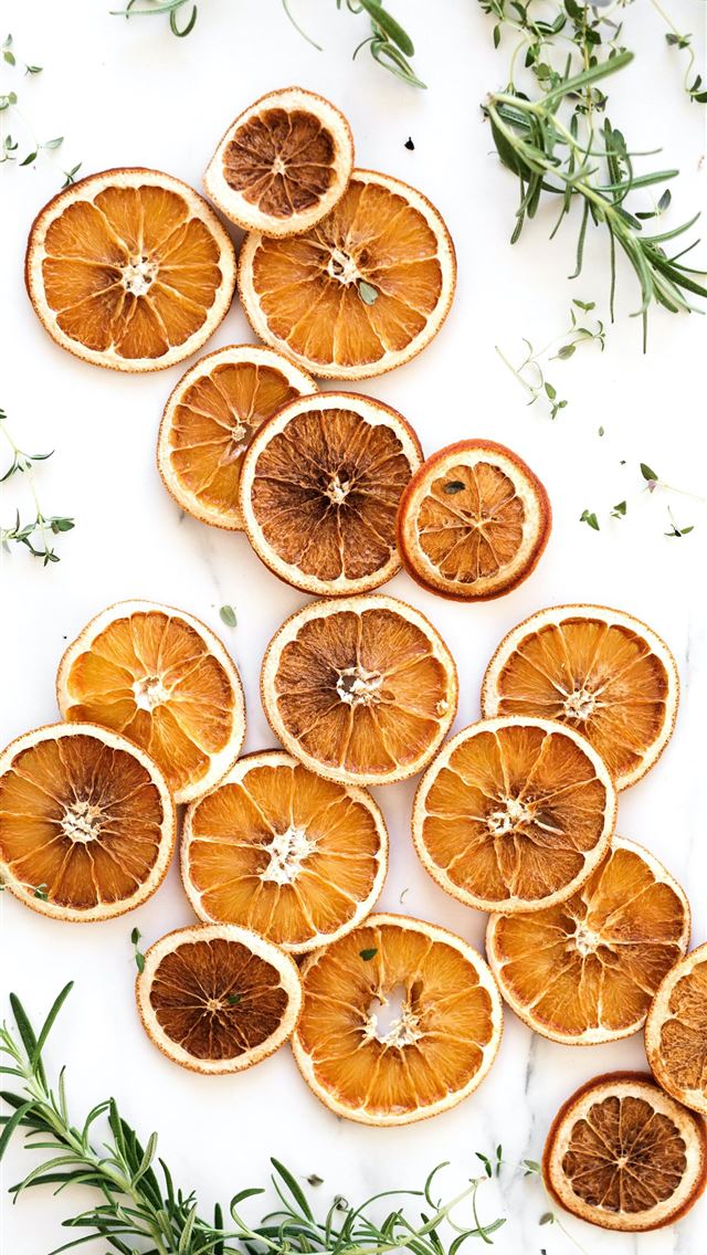 640x1136 sliced lemons surrounded by green herbs - fruit iPhone Wallpaper