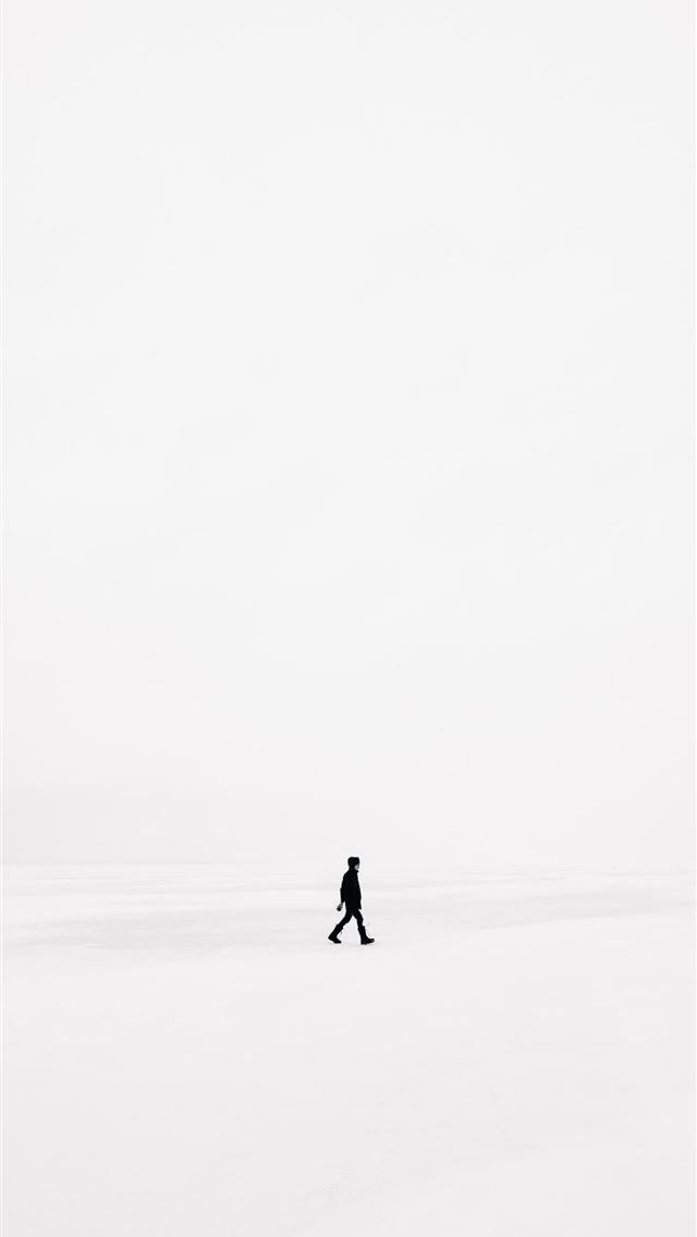 640x1136 person walking on snowfield - canada iPhone Wallpaper