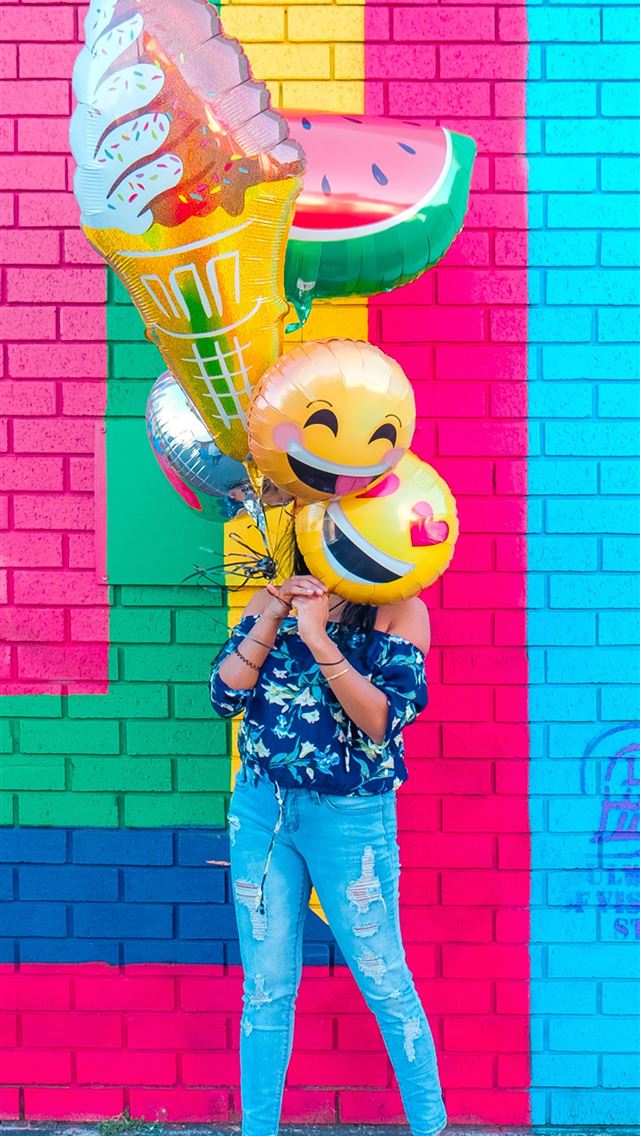 640x1136 woman covering face with assorted ballons - australia iPhone Wallpaper