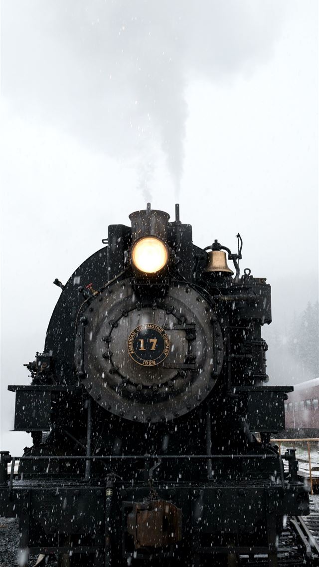 black train on railway at daytime iPhone wallpaper 