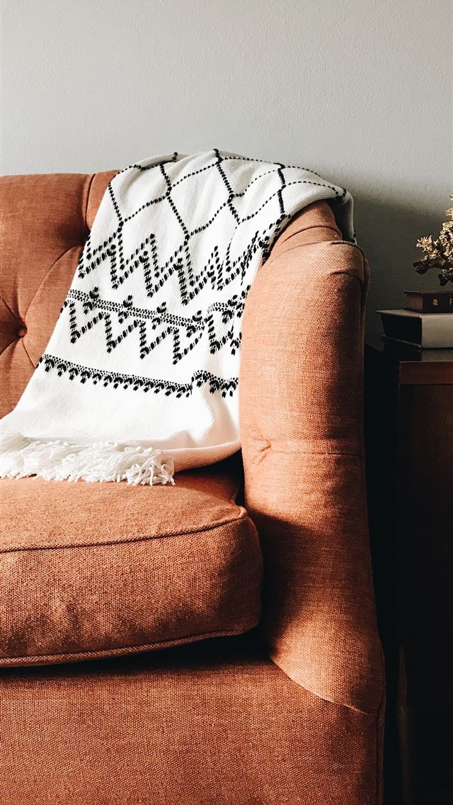 640x1136 white and black textile on brown couch - website iPhone Wallpaper