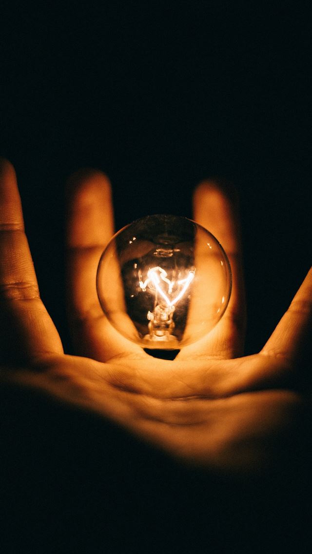 640x1136 clear glass bulb on human palm - diamond iPhone Wallpaper