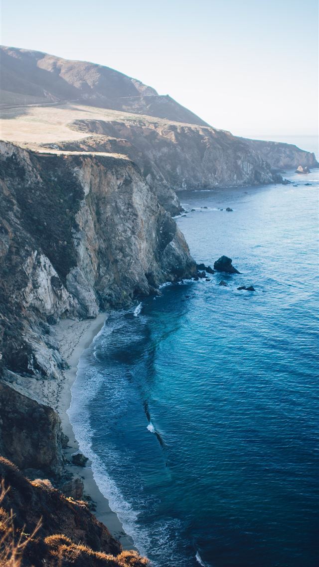640x1136 photo of cliff near shore - bixby creek bridge iPhone Wallpaper