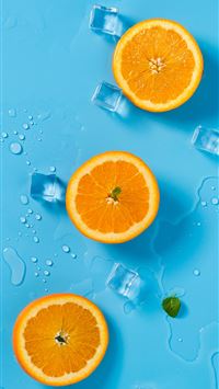 three sliced citrus oranges wallpaper