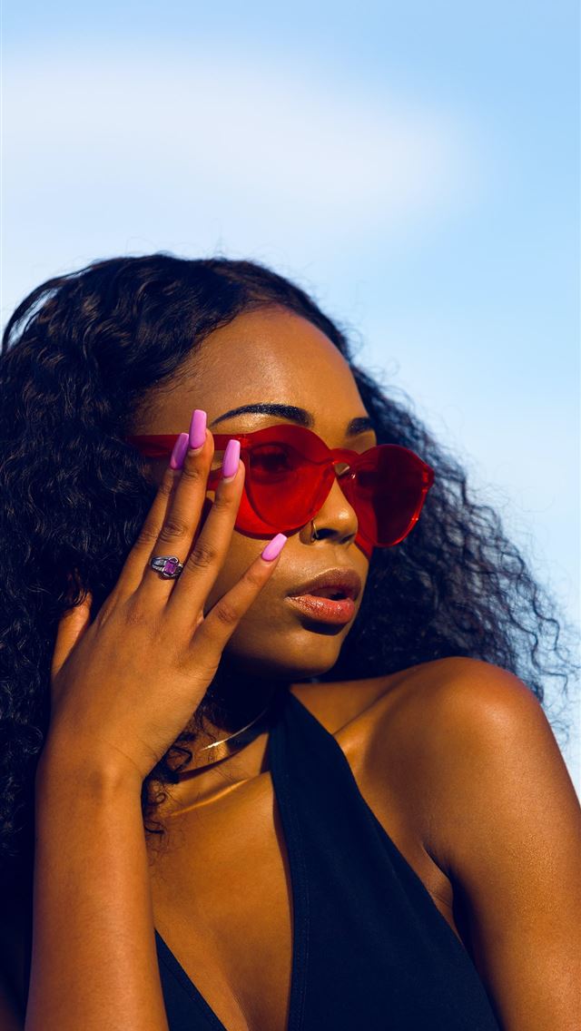 640x1136 woman holding her sunglasses - houston iPhone Wallpaper
