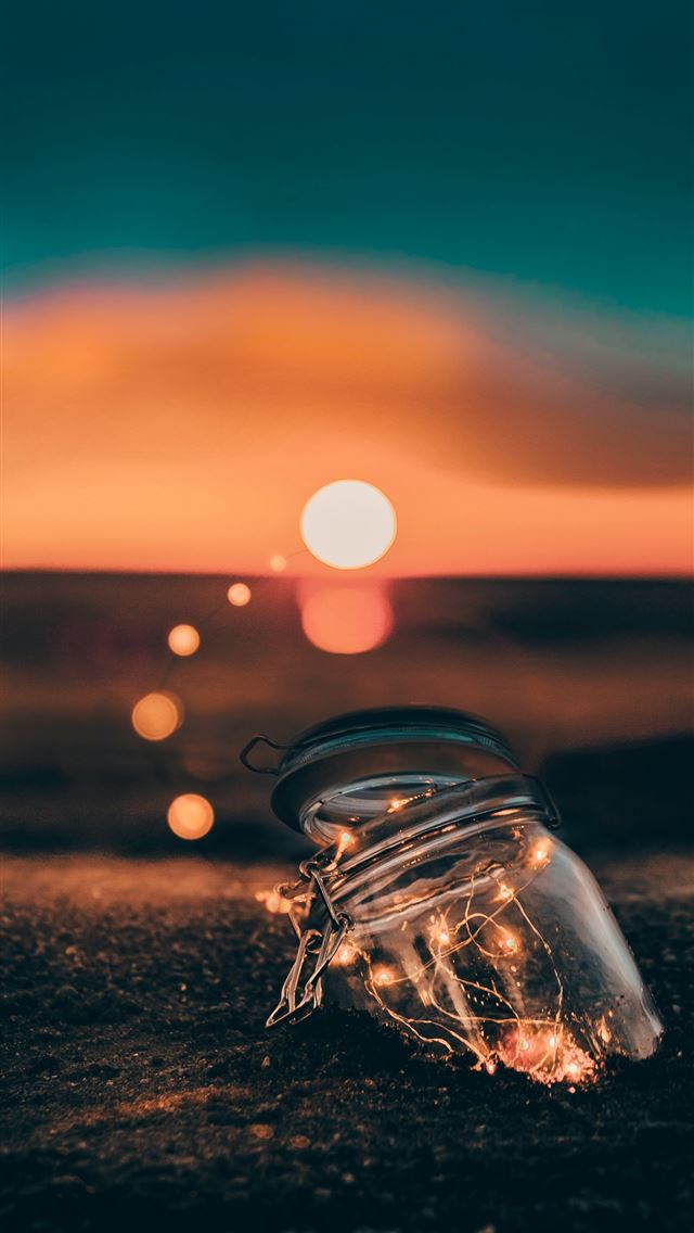 640x1136 clear glass jar on sand - canada iPhone Wallpaper