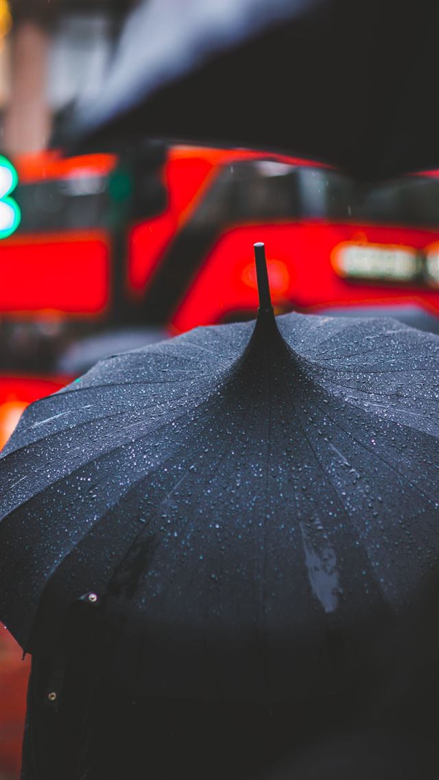 640x1136 person holding black umbrella - united kingdom iPhone Wallpaper