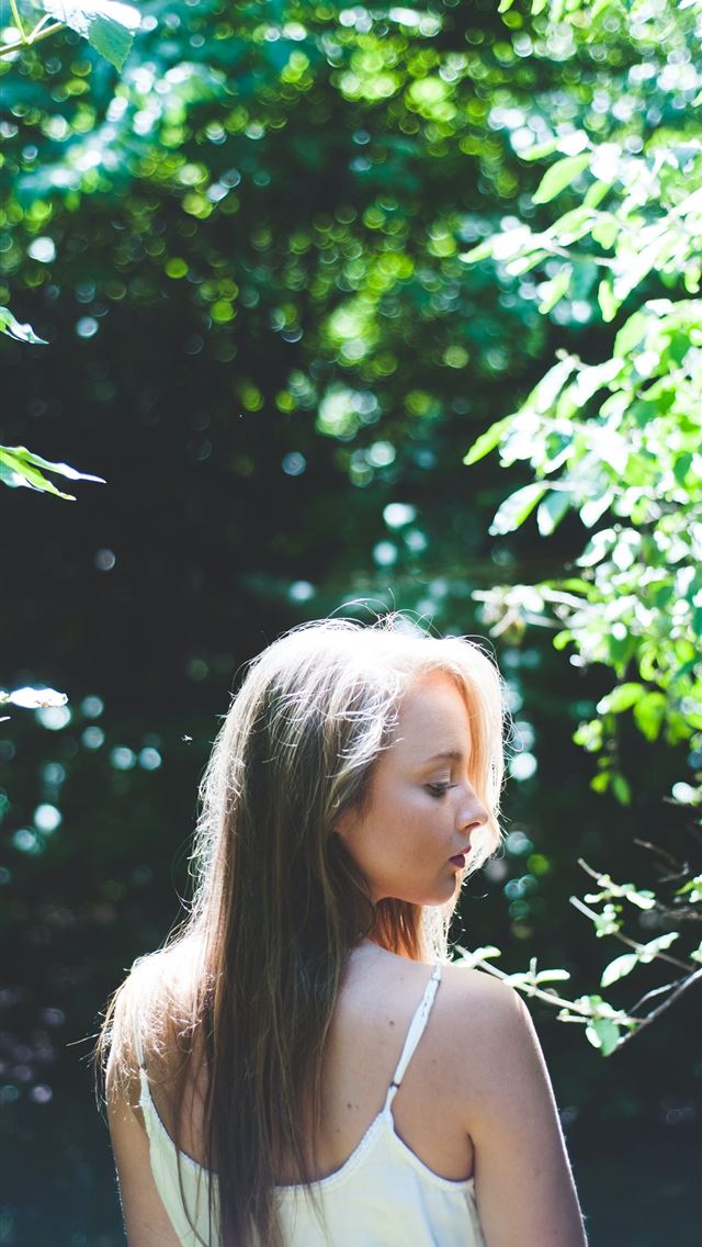 640x1136 woman standing near tree during daytime - girl iPhone Wallpaper