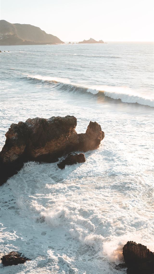 640x1136 seawaves near mountain - water iPhone Wallpaper