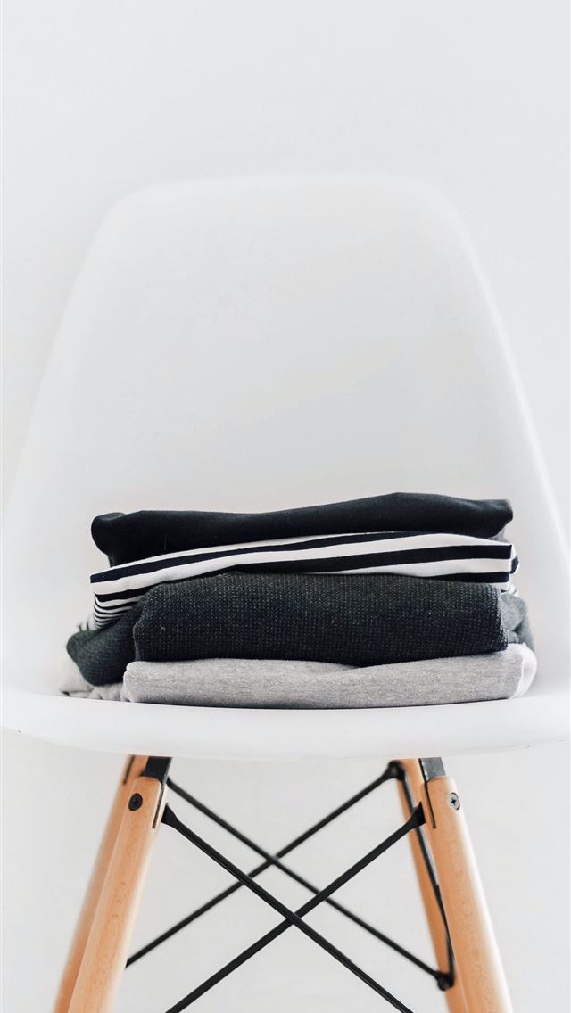 640x1136 pile of black white and gray textiles on white pad... - website iPhone Wallpaper