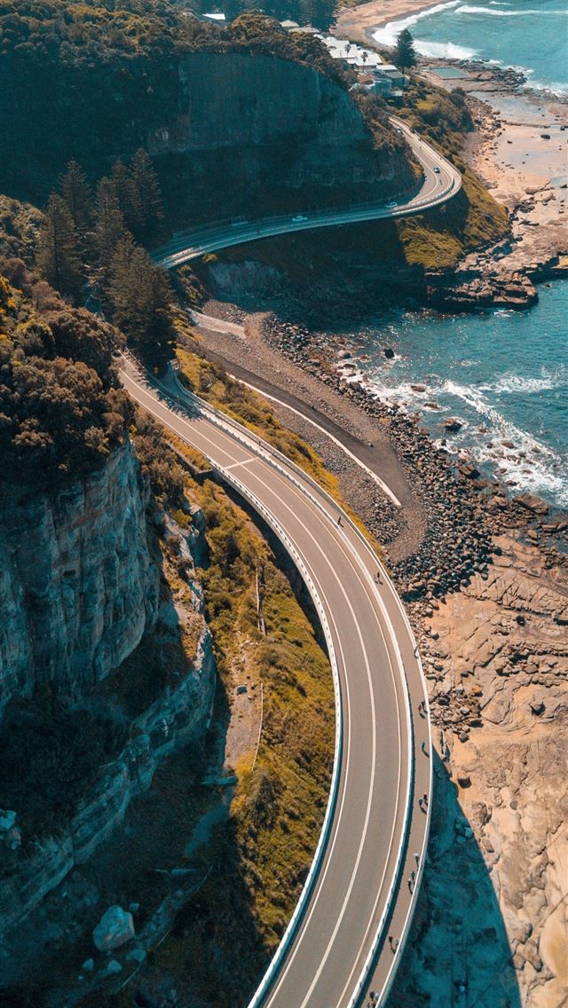 640x1136 birds eye view of highway beside bay - sea cliff bridge iPhone Wallpaper