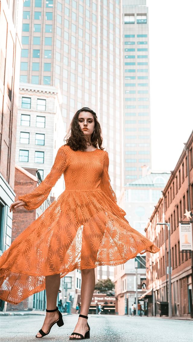 640x1136 woman in orange long sleeved dress between buildin... - boston iPhone Wallpaper
