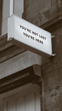 white and black signage wallpaper