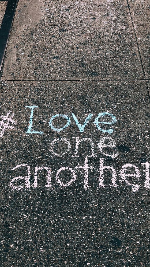 love one another chalk written on concrete floor iPhone Wallpapers Free ...