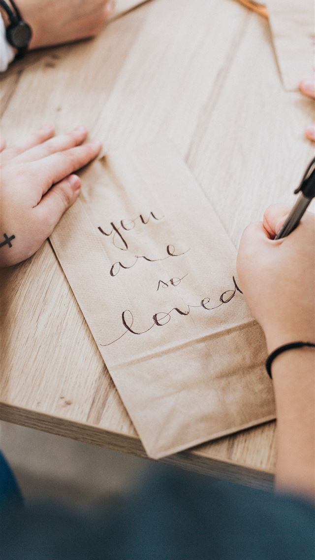 640x1136 person writing on brown paper - quotes iPhone Wallpaper