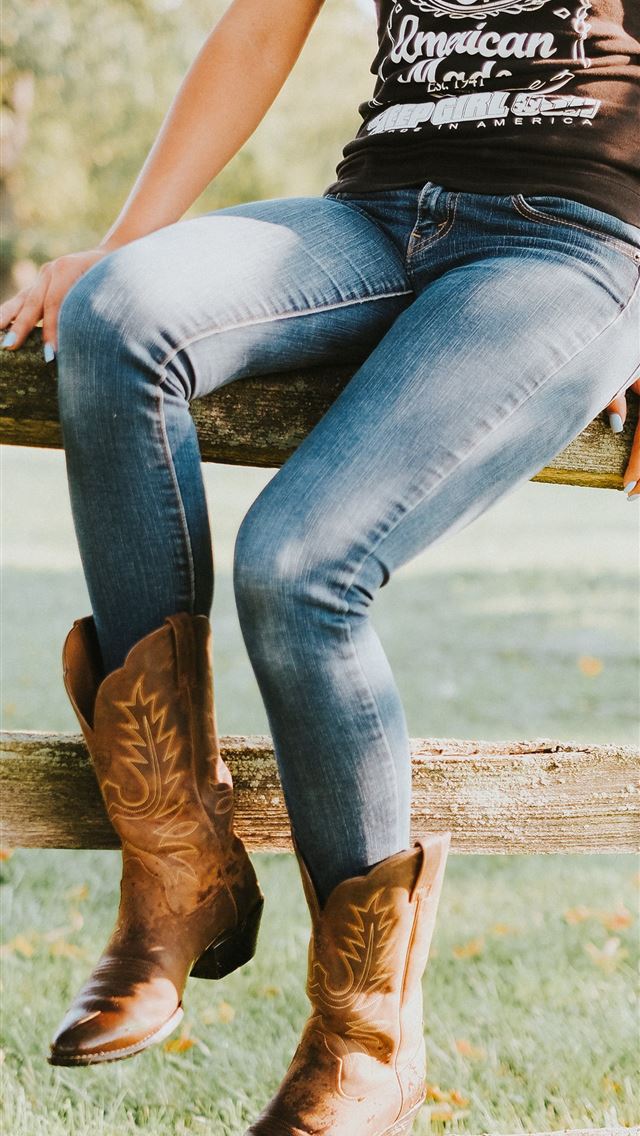 640x1136 woman sitting on brown wooden fence - united states iPhone Wallpaper