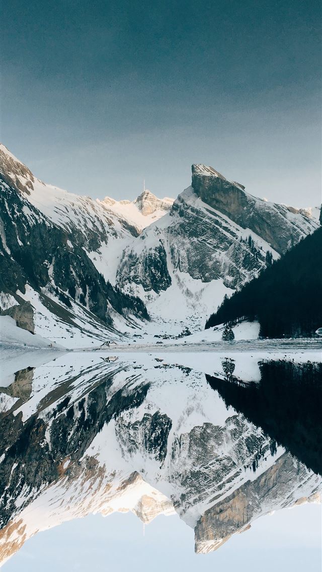 640x1136 snow covered mountain near lake under blue sky - schweiz iPhone Wallpaper