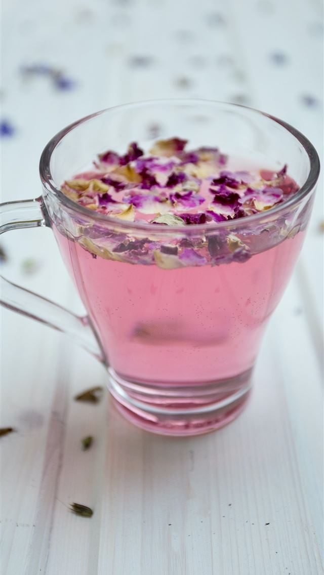 640x1136 clear glass cup surrounded by petals - spring iPhone Wallpaper