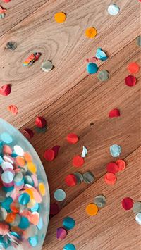 assorted color of sprinkle dots on brown floor wallpaper