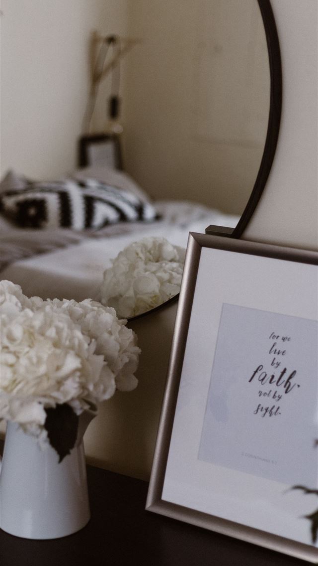 640x1136 white potted flowers beside photo frame - bible iPhone Wallpaper