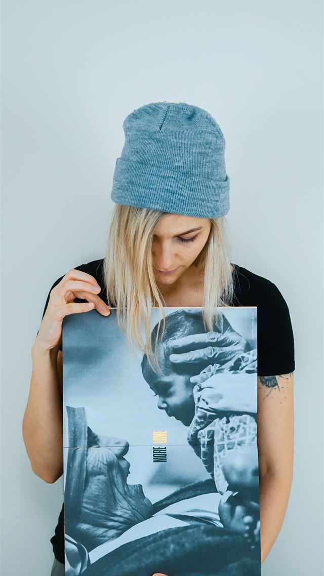 640x1136 woman holding Mother Teresa holding baby poster - united kingdom iPhone Wallpaper