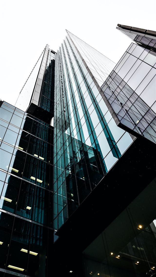 640x1136 low angle photography of building - window iPhone Wallpaper