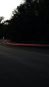 concrete road with cars passing wallpaper