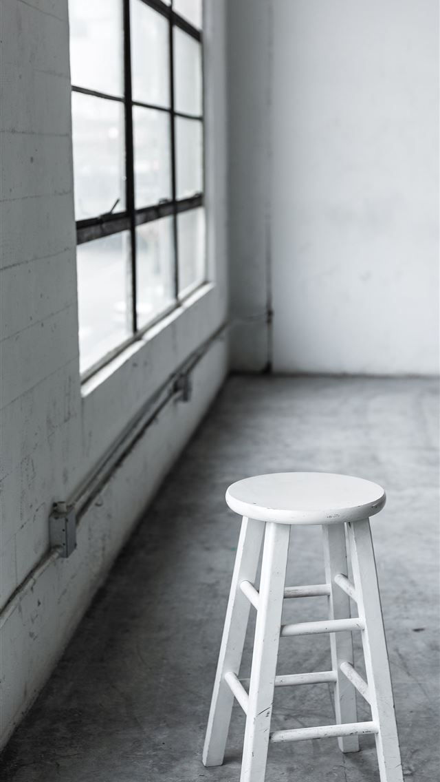 640x1136 round white wooden stool near closed window - los angeles iPhone Wallpaper