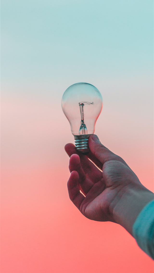 640x1136 person holding light bulb - toluca iPhone Wallpaper