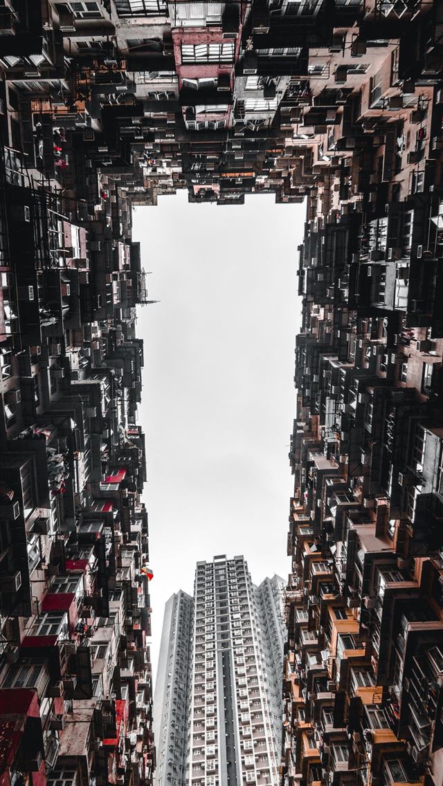 640x1136 worm's eye view of concrete buildings - hong kong iPhone Wallpaper