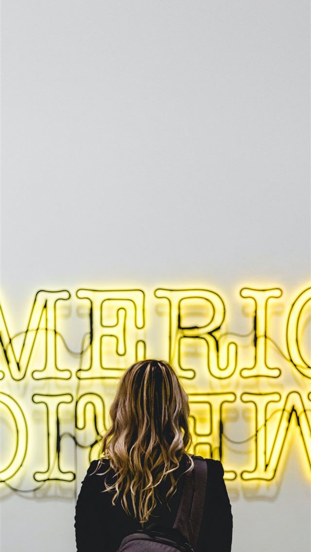 640x1136 woman in front American lighted signage - los angeles iPhone Wallpaper