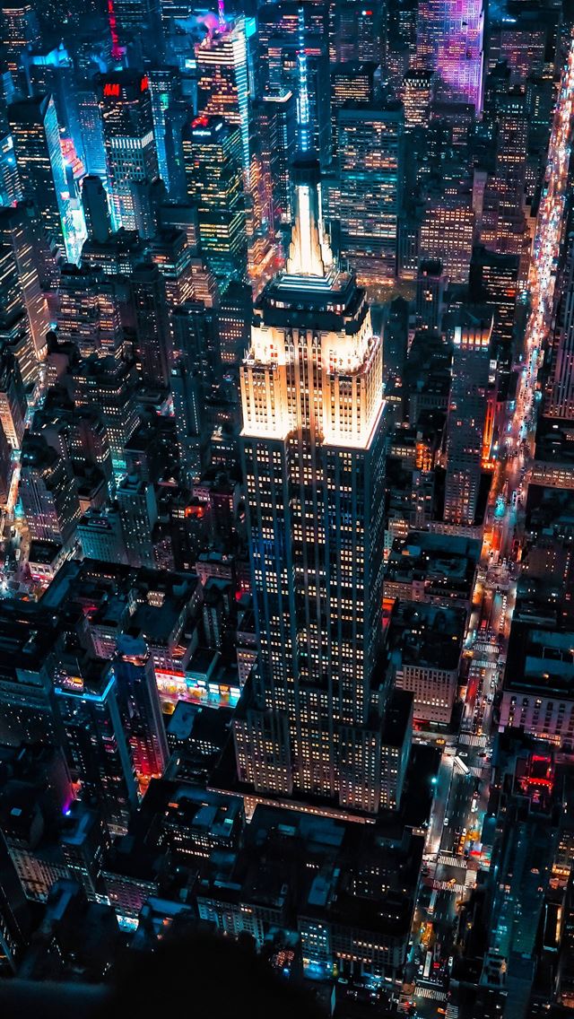 640x1136 aerial view of city buildings during night time - landscape iPhone Wallpaper