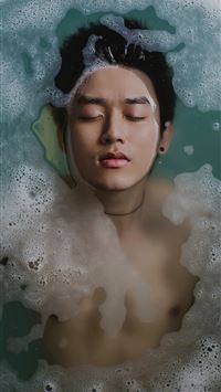 man floating in water wallpaper