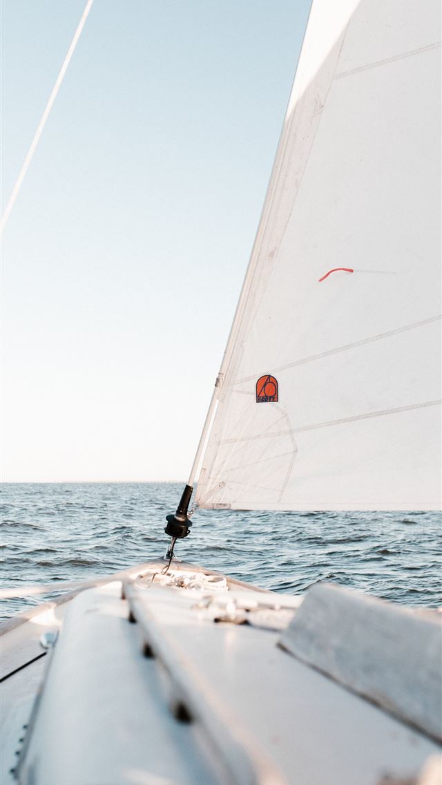 640x1136 person sailing on ocean - bright iPhone Wallpaper