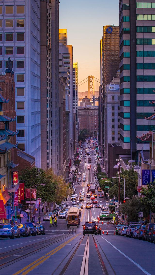 640x1136 car lot surrounded by high rise building - line iPhone Wallpaper
