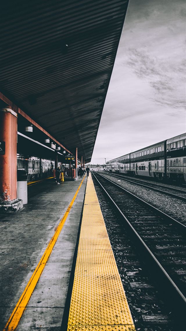 selective color photography of train railways iPhone wallpaper 