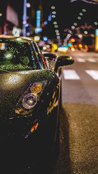 close photography of black convertible on road wallpaper