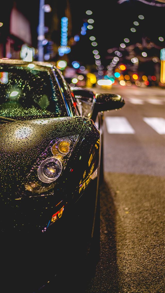 640x1136 close photography of black convertible on road - car iPhone Wallpaper