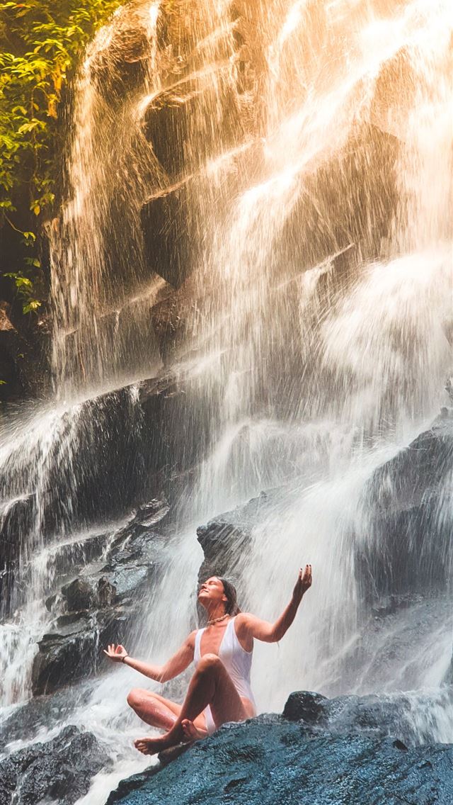 640x1136 woman in white monokini sitting on rock - kabupaten gianyar iPhone Wallpaper