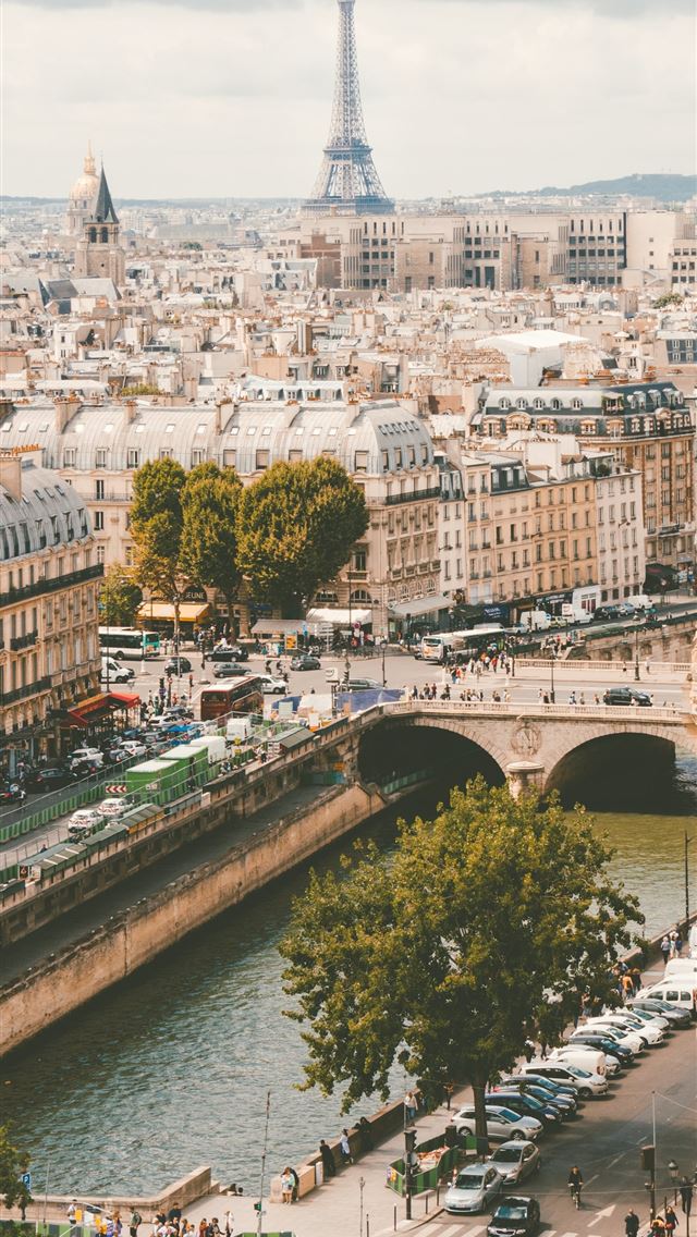 640x1136 group of people walking near body of water and bui... - france iPhone Wallpaper